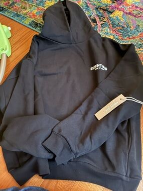 Fear of God ESSENTIALS Black Hoodie in Branded Packaging